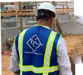 Worker wearing Tindol Construction Safety Jacket